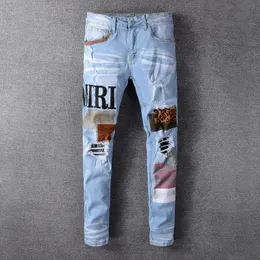 Jeans da uomo Fashion Patch Strappato blu Uomo Slim Fit Designer Pantaloni in denim lavato Hip Hop DJ Party Pantaloni punk rock