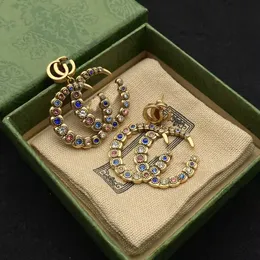 2021 nova marca de moda brinco cor G diamante duplo letra G bronze material personalidade Brincos femininos festa de casamento designer de jóias