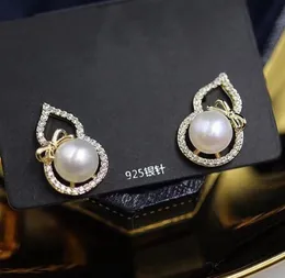 14K Gold Gurd Bow Crystal Studs Naturalne kolczyki z perłami słodkowodnej Białe damę/dziewczyna weselna biżuteria