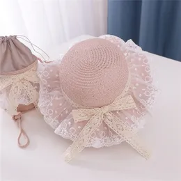 Baby Summer Accessories Holiday Child Girl Hat Hat Oddychanie Słomka Plaży Hollow Out Lace Up Bandage Cap GX220630