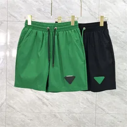 Roupa de banho masculina moda nova verde triângulo padrão calção de banho casual cinco minutos calças de praia shorts masculinos verão fino calças esportivas