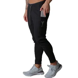 Męskie spodnie dresowe menu bawełniany szczupły jogging Niewidzialny kieszeń męski na siłowni fitness sportowy moda zamek błyskawiczne kulturystyka