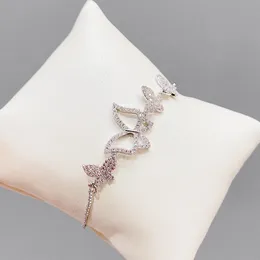 Brand luxury charm shiny zircon pull butterfly bracelet for women Korean version fashion personality 18k gold plated hand jewelry accessories 2023 gift