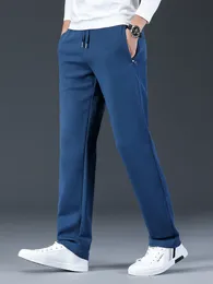 Sprężyna kieszenie na suwak długie spodnie dresowe mężczyźni Joggery niebieskie czarne szare sportowe spodnie proste tory.