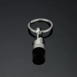 Hurtowe prezenty promocyjne srebrne metalowe tłokowy samochód klęcznikowy klawisza silnika silnik FOB Kluczowe klawisze pierścieni Pierścienie DE376