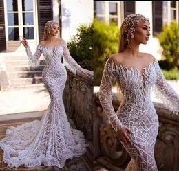 Luxury Shiny Mermaid Wedding Dress Pärlor Petspetsar Tassel full ärm Brudklänning Kristall golvlängd