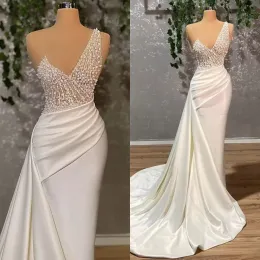 Sjöjungfrun 2022 designer klänningar brudklänning en axel rem pärlor illusion toppanpassade ruffles ruched sydafrikanska strandbröllop
