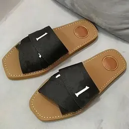 Women Sandal Woody Flat Mule في قماش الحزام مصمم سيدة نسائية رسائل النسيج في الهواء الطلق الجلود الوحيدة الصندل غير الرسمي 0004