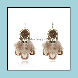 Dingle ljuskrona örhängen smycken europeisk och amerikansk ny fjäderhänge mode rund ihålig vävd retro bohemisk kreativ droppe lever