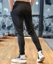 Herrbyxor is silke snabba torra bekväma män som driver fotboll basket träning byxor jogga fitness gym träning sport pantsmen's drak