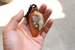 Hand-crafted, pure and natural emerald cash conch (leaf type) lucky pendant necklace (only one)