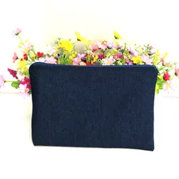 Borsa per il trucco spessa e resistente in denim blu scuro di puro cotone da 14 once con fodera in vero rosso e astuccio in denim con cerniera blu scuro