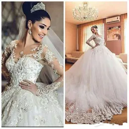 Vintage Bröllopsklänningar 2016-2017 Sheer Neck 3D Appliques Långärmade Bröllopsklänningar Lyx Tulle African Saudiarabien Bridal Klänningar
