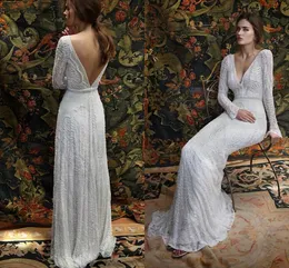 Romantisk Bohemian Lace Backless Wedding Dresses V Neck Långärmad Trädgårdsstrand Bröllopklänningar Fairy Sweep Train 1970s Hippie Boho Bröllop