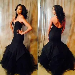 Stunning African Dress Black Mermaid Prom Dresses Beaded Sweetheart Neck Sleeveless Open Back Fit and Flare Ruffles Evening Party Gown