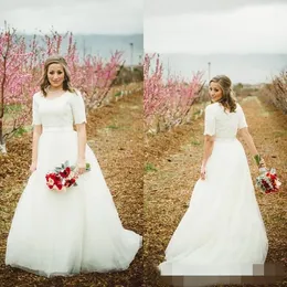 Modest Bröllopsklänningar med ärmar Billiga Högkvalitativa Scoop Neck Kortärmad Lace Top A-Line Informell Bridal Gown med Sash