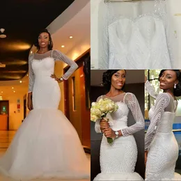 2017 Ny Afrikansk Nigeria Nya Mermaid Bröllopsklänningar Juvel Neck Långärmad Kristall Beaded Pearls Sweep Train Custom Formal Bridal Gowns