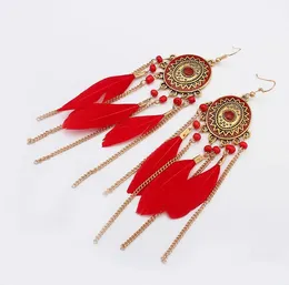 New arrival charm Summer new Bohemian disc feathers tassel earrings Long temperament fashion contrast color earrings