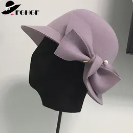 FGHGF Elegant Formella Kvinnor Ullfilt Hat Vinter Fedoras Cloche Bowler Hat med Bow Ladies Wedding 2018 Cap