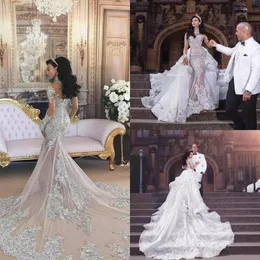 Retro sparkly 2019 Bröllopsklänningar med avtagbar kjol Sheer Mermaid Beaded Lace Illusion Långärmade Arabiska kapell Bridal Gowns Dubai