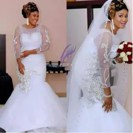 African Mermaid Wedding Dresses Illusion Jewel Neck Long Sleeves Crystal Beading Sheer Back Sweep Train Plus Size Formal Bridal Gowns