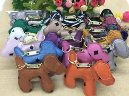 Nya Charms Keychain Fashion Ryggsäck Kedja Hängsmycke Creative Unisex PU Animal Dog Ryggsäck Nyckelkedjegåva