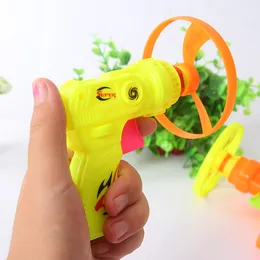 Disco volante del giocattolo dei bambini liberi di trasporto che vende piccola pistola creativa del disco volante del ragazzo del giocattolo