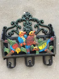 Antyczne wiktoriańskie żelazo pomalowane ptaki z szafką na ścianę szelfowa ścienna poczta kluczowy stojak 3 haczyki