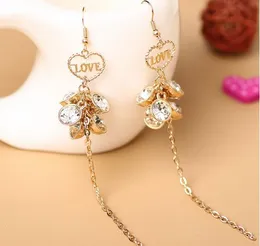 Nya heta sydkoreanska zircon guldpläterade örhängen med trippel-en diamant hjärta kärlek örhängen är chic och elegant