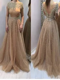 Luksusowe Gold Backless Evening Suknie Formalne Długie Tanie Linia Tulle Rhinestones Bling Crystal Cap Krótkie Rękawy Prom Dress