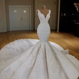 Abiti da sposa a sirena con corsetto sexy di Dubai Abiti da sposa con scollo a V profondo senza maniche Appliques in pizzo Abiti da sposa Abito da sposa su misura Sweep Train