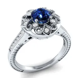2018 Ny ankomst Original Desgin Vintage Mode Smycken 925 Silver Fill Round Shape Blue Sapphire CZ Dimaond Bröllop Band Ring för kvinnor
