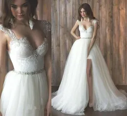 Nowe Suknie Ślubne Krótkie Plażowe z odpinanym pociągu Cap Rękawy Crystal Sash Backless Bohemian Country Suknie ślubne Vintage Boho Wedding