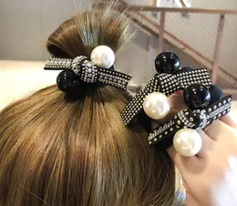 Retro light luxury black and white pearl head rope hair ring Korea Dongdaemun personality rubber band ball hair rope