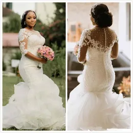 Ny Luxury Lace Beaded Wedding Dresses Plus Size Pearls Sheer Neck Half Sleeves Mermaid Bridal Dresses Ruffles Organza Bröllopsklänningar