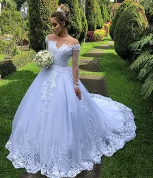 Ziarna złudzenie z długim rękawem Suknie ślubne Linia Sweep Lace Aplikacje Suknia Ślubna Vestido De Novia