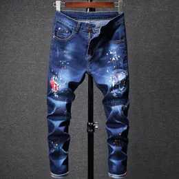 Fashion-2019 Nyligen modemän jeans blå färg förstör jeans trasiga byxor smala passform punk stil färg tryckt stretch byxor