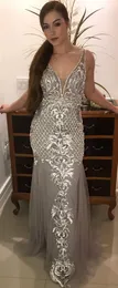 2020 Arabisch Aso Ebi Silber Spitze Perlen Abendkleider Tiefer V-Ausschnitt Meerjungfrau Ballkleider Sexy Formale Party Zweite Empfangskleider ZJ256