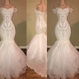 Nuevos vestidos de novia de sirena sexy fuera del hombro Apliques de encaje Cuentas de cristal Cremallera Volver Tren de barrido Árabe Tallas grandes Vestidos de novia formales