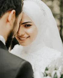 2020 Bellissimi veli da sposa musulmani con molte perline e perle Real Pos Bling Bling Spose musulmane Hijab Lunghezza punta delle dita281u