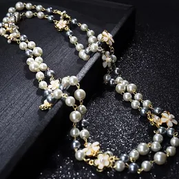 Wholesale-luxury designer beautiful flowers classic elegant pearls multi layer long sweater statement necklace for woman