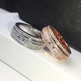 Europa amerika mode varumärke smycken dam mässing rotation fyra cirkel diamant bokstäver 18k guld förlovnings ringar 2 färgstorlek 6-8
