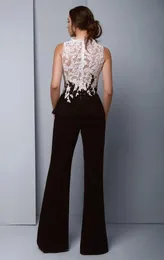 Women Jumpsuits 2020 Prom Dresses Black and White Lace aftonklänningar med fickor Saudiarabisk lång formell klänning Sexig byxdräkter236y