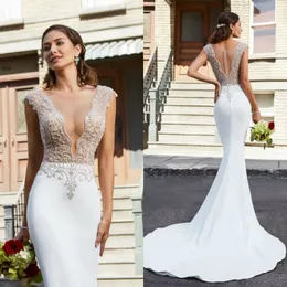 Abiti da sposa a sirena con scollo a V profondo trasparente 2019 Top in pizzo Pulsanti di perline importanti Indietro Abiti da sposa da spiaggia Custom Made vestido de novia