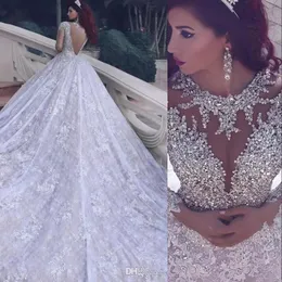 Sexy arabische Brautkleider in A-Linie, mit Juwelenausschnitt, langen Ärmeln, voller Spitze, Applikationen, silberner Kristall, transparenter Rücken, Übergröße, Kapellenschleppe, Brautkleider