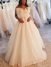 Elegante avorio semplice linea A abiti lunghezza pavimento organza davanti grande fiocco spiaggia giardino abito da sposa taglie forti