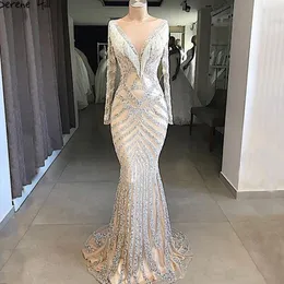 Neue Dubai Nude Mermaid Prom Kleider 2022 Lange Ärmel Perlen Quaste Mode Formale Abendkleider Arabische Kleider