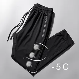 Pantaloni da uomo ad asciugatura rapida taglie forti Pantaloni estivi traspiranti in seta di ghiaccio Pantaloni da uomo casual a sezione sottile Pantaloni larghi maschili larghi 8XL