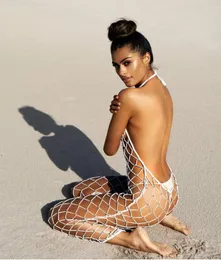 Gorąca Sprzedaż Letnie Kobiety Backless Dress Hollow Out Fishnet Cover-Up Spaghetti Pasek Plażowa Sukienka Patrzeć przez Długie Swimwear Szybusza