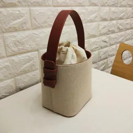 Designer- Axelväska Designer Shoulder Bucket Väskor Burlap Kontrast Små väska Nya axelmässiga säckar Mens Cross Body 16.5 * 10 * 17a